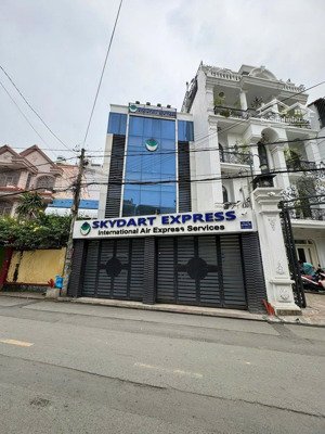 bán nhà mặt tiền trường sơn - dt: 11x28m - 3 tầng - xd: hầm + 8 lầu - giá bán: 45 tỷ tl - tin thật