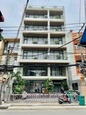 bán gấp ! tòa nhà góc 2 mặt tiền hà huy giáp - dt: 19 x 29m - 7 tầng - hđt: 230 tr. giá chỉ 55 tỷ