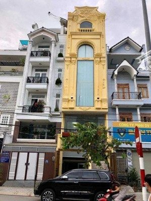 nhà mt phạm huy thông - dqh, p.6, gv. dt: 5m x 16m hầm trệt 5 lầu, có thang máy, giá; 23,5ty tl