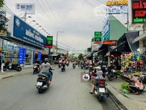 nhà 2 lầu + 16p trọ thu nhập 30tr/th. mặt tiền chợ đoàn thì kia. lh: 