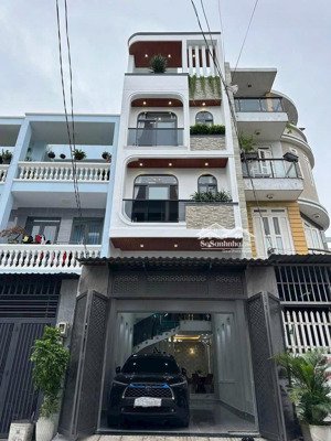 bán căn nhà 83,5m2(5,5m x 15m) đường huỳnh văn bánh/ q phú nhuận, giá 4.690 tỷ. 2 tầng 5 phòng ngủ.