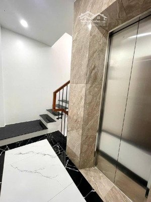 bán nhà nghi tàm mới 100%, ngõ thông, 33m2, 5 tầng, thang máy, 9.4 tỷ