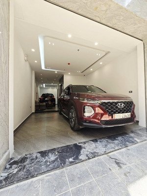 hoàng quốc việt - 58/65m - 7 tầng thang máy - gara - vỉa hè - mt 4.5m - 31.8 tỷ