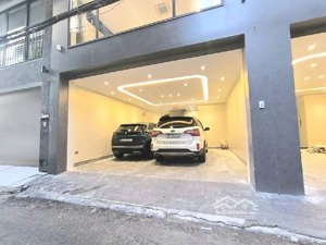 siêu phẩm hào nam 50m x 7 tầng thang máy ô tô vào nhà mới kính koong