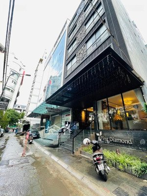 bán nhà phố duy tân, trần thái tông, lô góc , thang máy, ô tô tránh, doanh thu 200tr/t. dt 120m2*9t