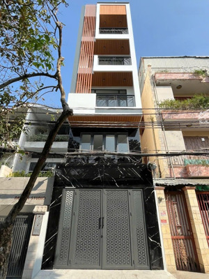 bán toà chdv thu nhập ổn định mặt tiền đường số tân quy - quận 7