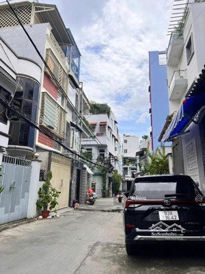 bán nhà hẻm xe hơi 7m bùi đình túy - khu bàn cờ thông xe hơi - nhà 4 tầng ô tô đỗ trong nhà.