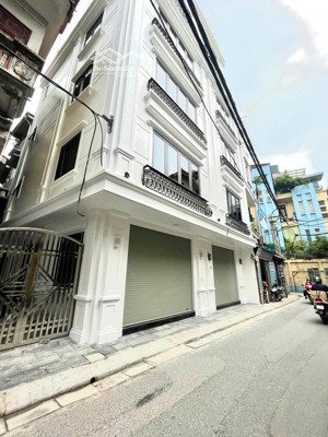 bán nhà mặt ngõ lô góc 18,5 tỷ 50m 7 tầng mt 4,7m vỉa hè ô tô tránh kinh doanh đội nhân ba đình