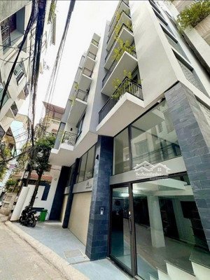 tòa apartment phố vĩnh phúc - mặt ngõ kd, ô tô tránh - dòng tiền 1 tỷ/ năm. 70m2 * 7 tầng tm.