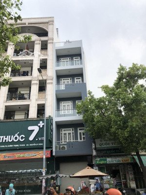 bán gấp mt hoàng hoa thám, p6, bt, 5m x21m cn 105m2, 7 tầng thang máy, giá 23,5 tỷ