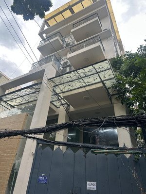 ngộp bank! bán gấp nhà góc 2mt hoàng hoa thám, tân bình, dt 9mx20m, ctxd: hầm + 7 tầng, giá 22 tỷ.