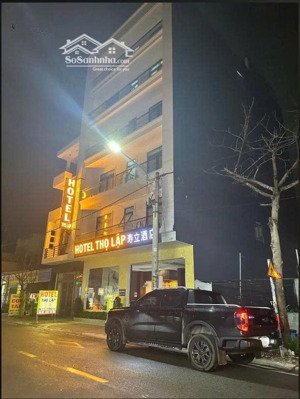 bán khách sạn ngay kdc việt sing - thuận an, bình dương. 10x20m - 7 tầng. hđt 110 tr/th. giá: 27 tỷ