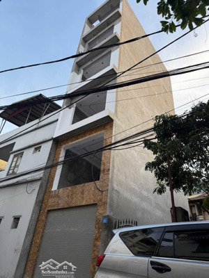 bán nhà 36 m2 xây 7 tầng thang máy ô tô tránh kinh doanh sầm uất thạch bàn