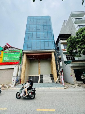 siêu phẩm tòa văn phòng lô góc 8 nổi + 1 hầm thang máy nhập khẩu dòng tiền 2.4 tỷ/năm