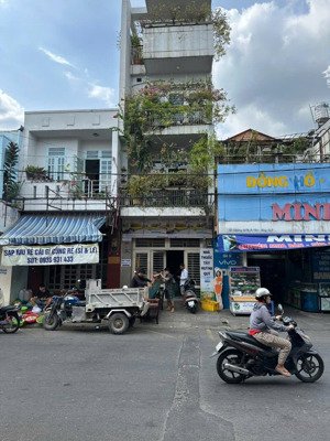 bán nhà 4 tầng mặt tiền kinh doanh ngay cổng chợ tân quy, đường số 15, quận 7
