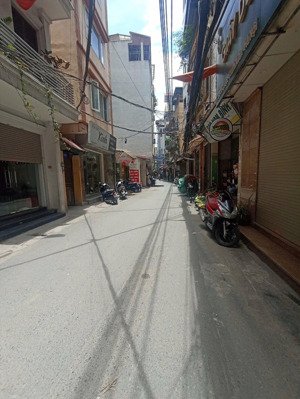 gia đình cần bán ccmn 9 tầng 13 phòng lô góc mặt phố cự lộc, ô tô, doanh thu gần 900tr/năm
