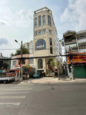 building tổng diện tích sử dụng 1300m2 - hầm giữ xe rộng, tuyến đường liên quận lê quạng định - qbt