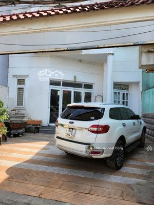 bán nhà 1 trệt 3 lầu (8x16m) có thang máy, gara xe hơi đường số 2 trường thọ
