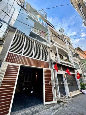 ngay ngã tư nguyễn văn trỗi - có garage oto - 73m ngang 5m - nhà đẹp 5 tầng do kts thiết kế