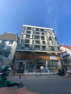 bán tòa nhà mặt tiền 7000m2 sàn 2 hầm 12 tầng đường lê quang định dt 15x42m hđt 450tr/th giá 150 tỷ