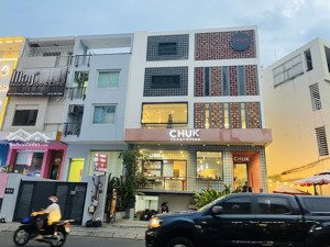 bỏ qua là tiếc ! toà nhà ngang 12m , hầm 6 tầng mặt tiền phổ quang ngay sân bay. hđt 220tr/th. 60ty