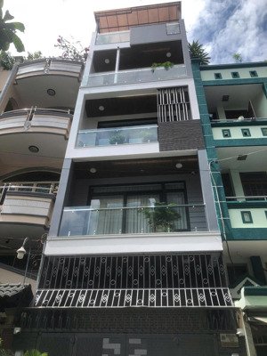 bán gấp nhà hxh 284 lý thường kiệt q10 - dt 5x18m, kc: hầm + 7 tầng, có thang máy, full nội thất