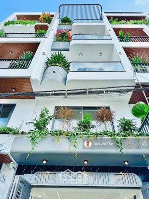 bán nhà bình thạnh có thang máy - đoạn vòng xoay lê quanh định( dt:4,5x12m + 5 tầng ) lh 