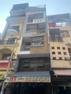 bán nhà mt đỗ ngọc thạnh _nguyễn chí thanh p15, q5. dt: 4.1x18.4m, hầm 5 tầng tm