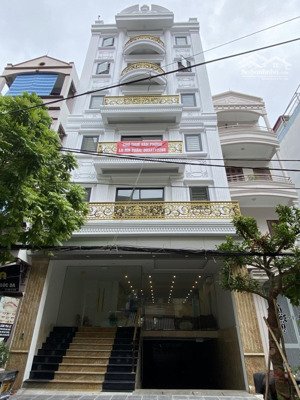 bán tòa văn phòng. phố trần duy hưng. dt 100m2 x 7 tầng + 1 hầm, mt 7.3m, vỉa hè rộng. giá 54 tỷ