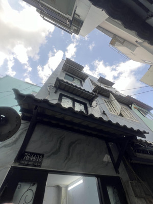 nhà 4 tầng , dtsd 29m2 , sát hẻm xe hơi , tôn thất thuyết quận 4.