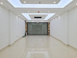 bán tòa nhà văn phòng mặt phố nguyễn khang trung hòa hà nội 90m2 9 tầng, mt 5.8m, vỉa hè ô tô đỗ
