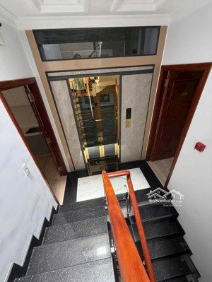 bán nhà mặt tiền mai văn vĩnh , quận 7. dt: 5,2x17m 4 lầu , thang máy . vị trí vàng