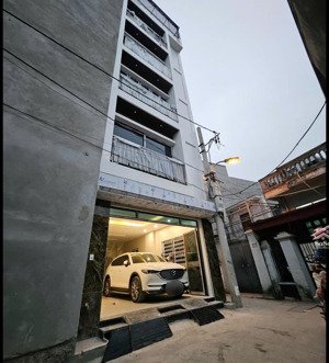 nhà đẹp ngõ 63 cổ linh gần aeon mall hồ thạch bàn 6 tầng thang máy ô tô vào lô góc 2 thoáng