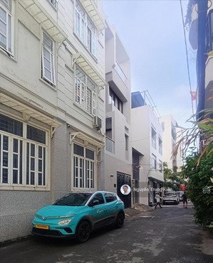 bán nhà hiện đại quận 7 - mt đường 7m xe hơi tránh - 5x10 - 3 tầng sân thượng. giá chỉ nhỉnh 10 tỷ.