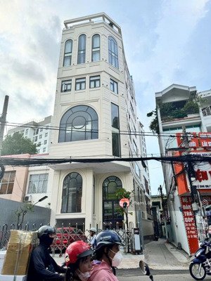 bán toà nhà lê quang định, phường 5, q. bình thạnh. dt: 9x25 kc hầm 7 tầng hđt: 350tr/th giá: 69 tỷ