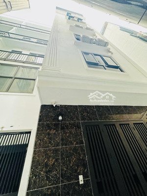 bán nhà trần thái tông, dt52m, mt5m, 7 tầng thang máy, ngõ thông, kinh doanh