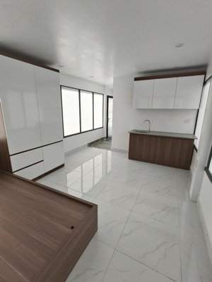 toà căn hộ mini tại cổng khu đh mỏ dt 52m2, 6 tầng thang máy, pccc, ô tô đỗ cổng