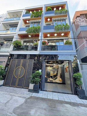 bán nhà xây mới ,full nội thất, xe hơi đậu trong nhà