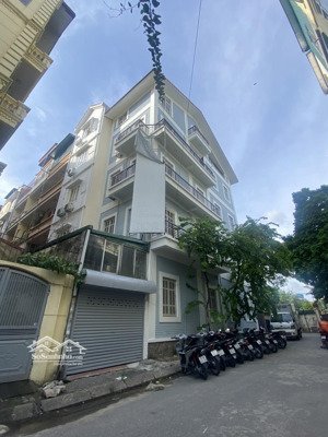 cho thuê nhà làm nhà nghỉ tại phố trần duy hưng , dt 80m x 5 tầng lô góc có 15 phòng kép kín