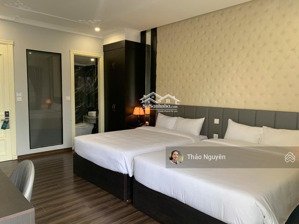 bán khách sạn 12 tầng dòng tiền 2 tỷ/tháng mặt phố dương đình nghệ, lh: 