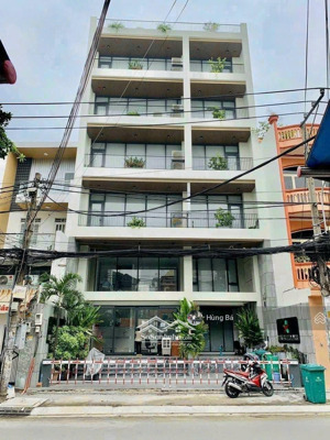 bán gấp ! tòa nhà góc 2 mặt tiền hà huy giáp - dt: 19 x 29m - 7 tầng - hđt: 230 tr. giá chỉ 55 tỷ