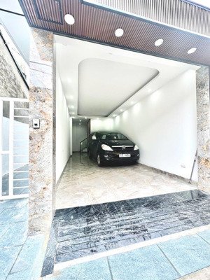 nhà lô góc 2 mặt thoáng 6 tầng thang máy, gara ô tô 47m mt 4.2m