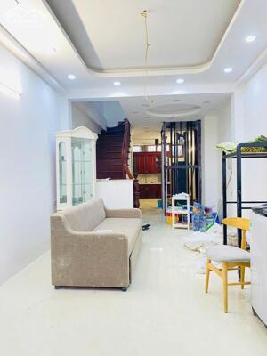 Bán nhà Thái Hà, Đống Đa sổ đỏ 63m - Ngõ thông, thang máy 2 thoáng vĩnh viễn