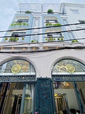 nhà đẹp xây mới bùi quang là p12 hẻm xe hơi trệt lửng 3 lầu tặng gull nội thất