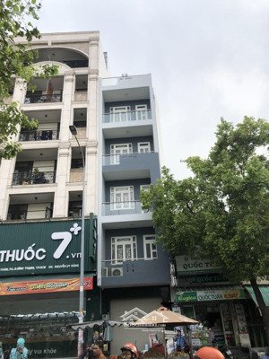 bán gấp mt hoàng hoa thám, p6, bt, 5m x21m cn 105m2, 7 tầng thang máy, giá 23,5 tỷ