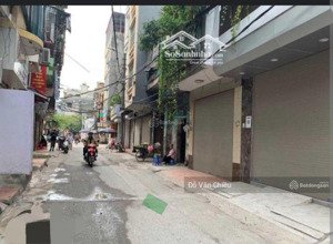 nhà mới - đống đa - ô tô đỗ cửa - thang máy - lô góc - 20m ra mặt phố .