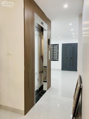 Bán nhà Hào Nam 52m2 phân lô oto tránh 7 tầng thang máy 22 tỷ