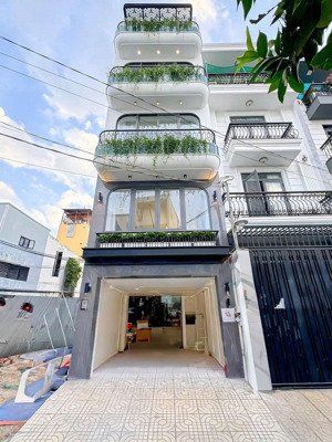 nhà phố hiện đại mới -thang máy -hẻm 8m xe hơi thông 2 chiều đường huỳnh tấn phát - q7 -