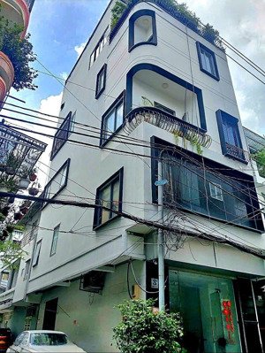 bán nhà gara oto, thang máy, măt tiền q4 giá 15 tỷ