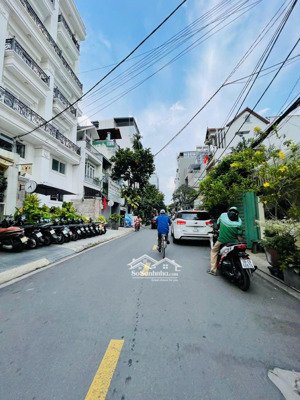 mặt tiền vừa ở vừa kinh doanh nổi tiếng sầm uất thảo điền _ hầm 5 tầng 66m2 _ đường nguyễn bá huân